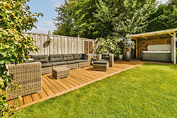 Wood deck with outdoor seating and a hottub